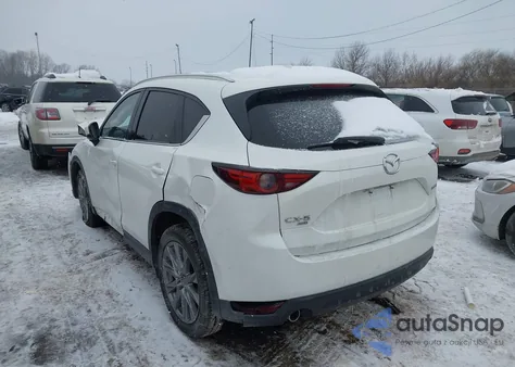 2021 Mazda Cx-5 Grand Touring z USA, uszkodzony, nr VIN JM3KFBDM5M0416493